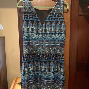 Semi-formal consisting of blue and metallic gold